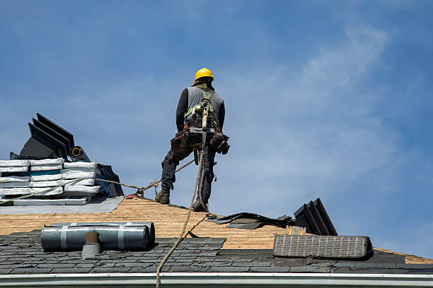 Professional Gutter Installation technician working in Minneola, KS